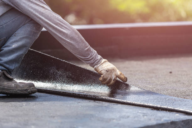 Professional Basement Waterproofing technician working in Shelbyville, MI